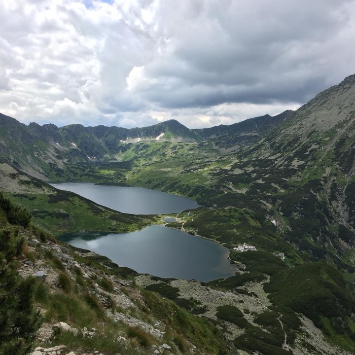 Dramatic panorama over Valley of Five Lakes with mountain hut