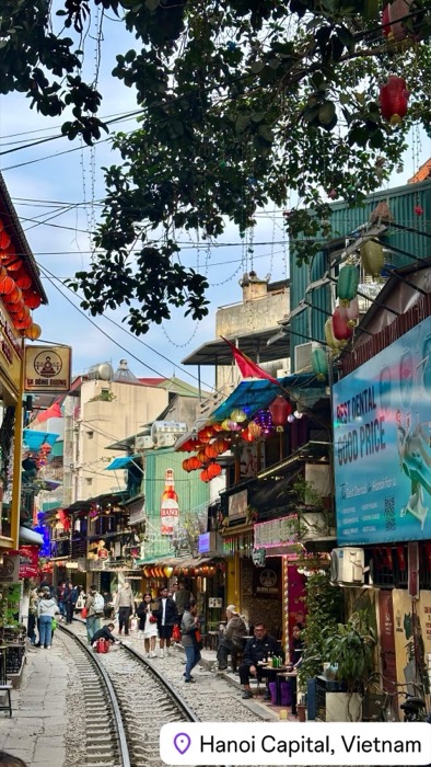 Hanoi Train Street: rails between lantern-strung cafes and houses