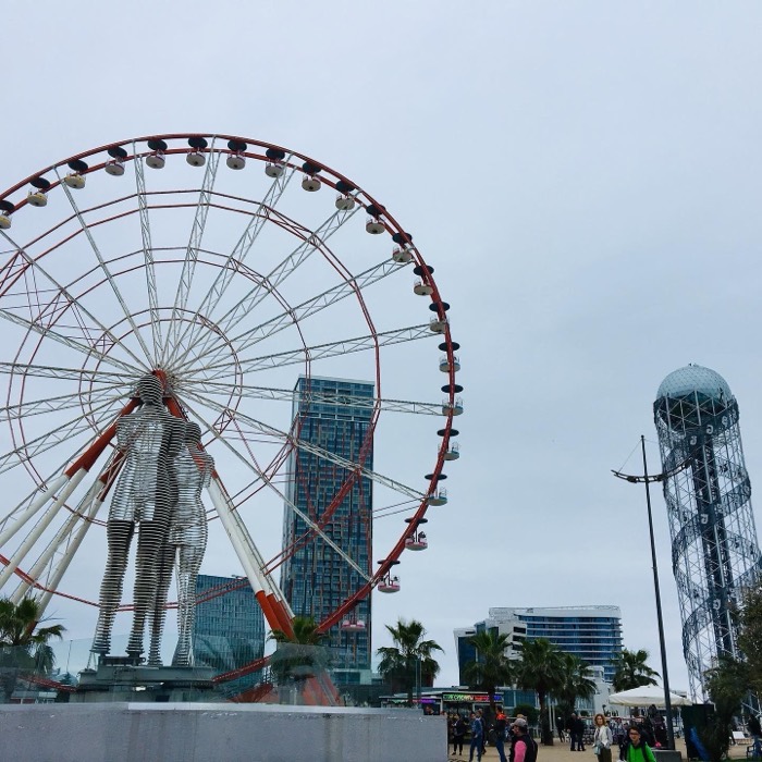 Batumi ferris wheel with Ali and Nino statue, Alphabet Tower