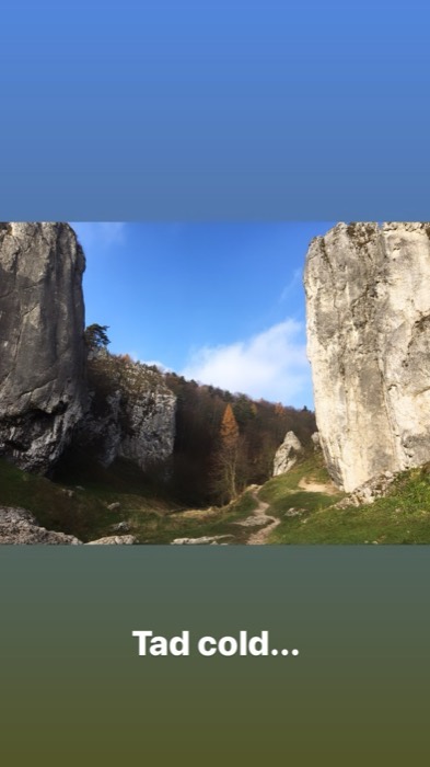 Trail between towering limestone gate rocks, late-autumn hike