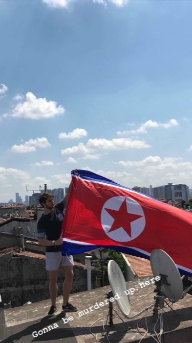 Joshua: unfurling North Korea flag on Istanbul rooftop, skyline behind