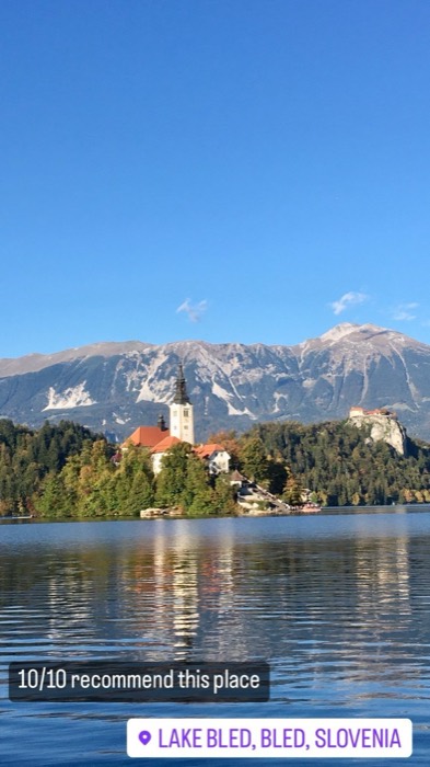 Lake Bled island church with Julian Alps backdrop, postcard-perfect