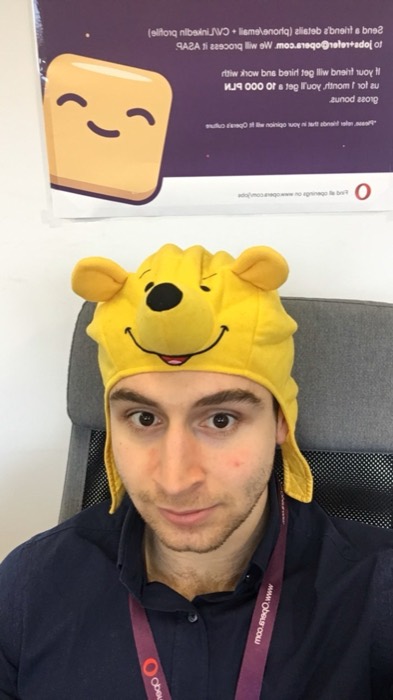 Joshua: Winnie the Pooh hat selfie at Opera office desk