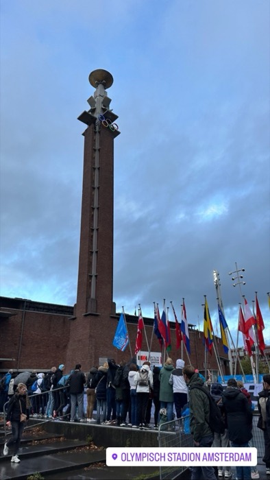 Olympic tower and national flags at Amsterdam Marathon, Olympisch Stadion