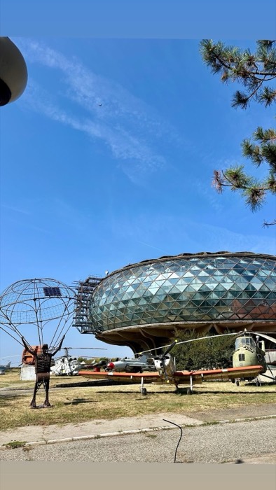 Belgrade Aeronautical Museum geodesic dome, helicopters and parachutist statue