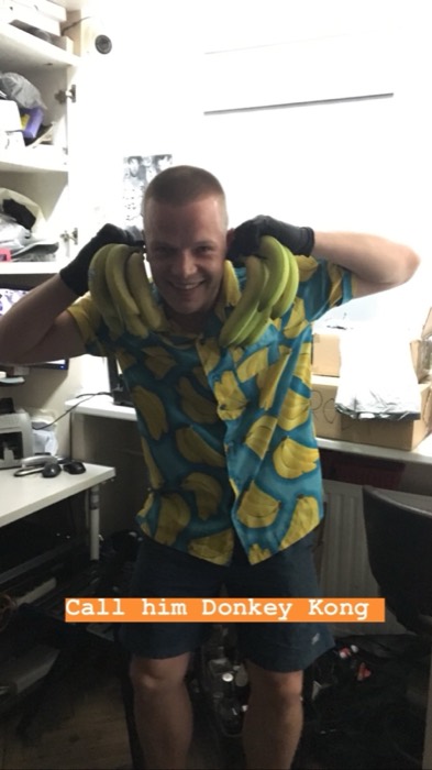 Friend in banana shirt draped with banana bunches, Donkey Kong joke