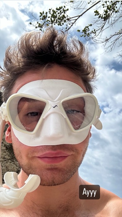 Joshua: grinning selfie in white snorkel mask before diving
