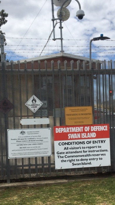 Restricted Defence Swan Island gate signage, security researcher sightseeing