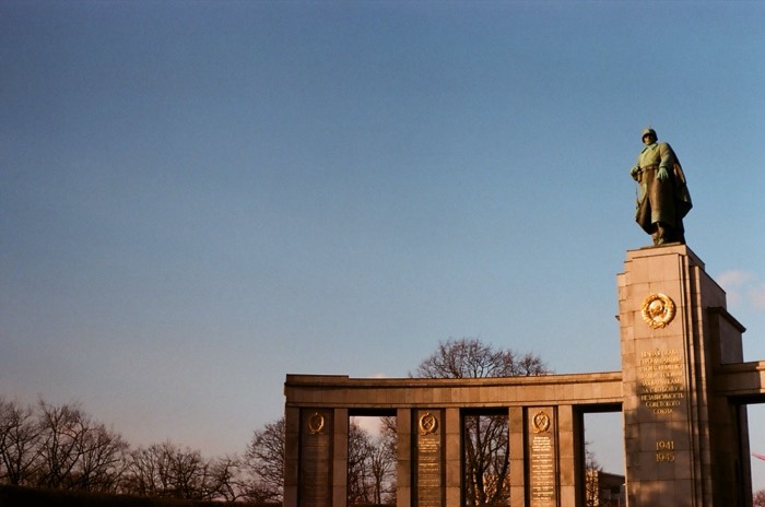 Soviet War Memorial soldier statue, Cyrillic 1941-1945, golden light