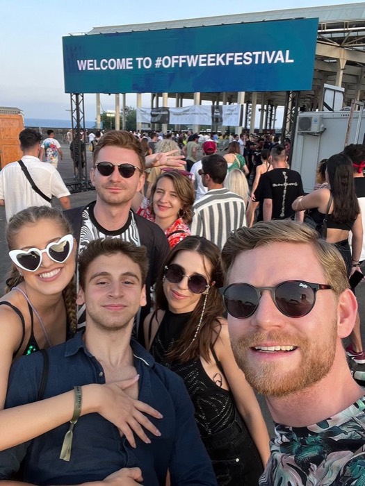 Joshua: group selfie under Off Week Festival sign, near-duplicate