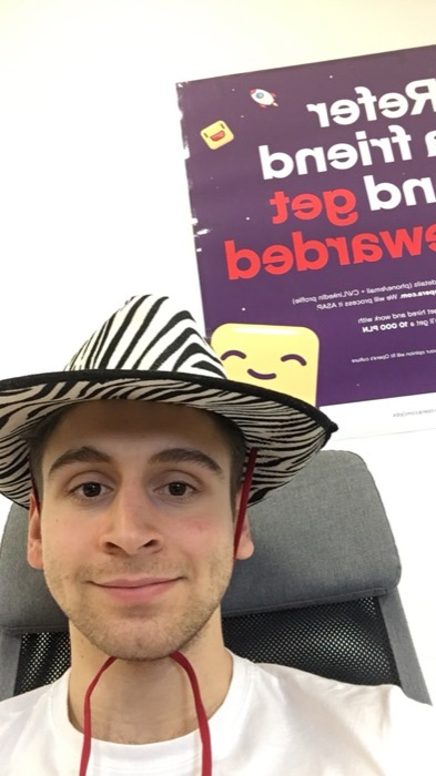 Joshua: selfie wearing zebra hat at Opera office