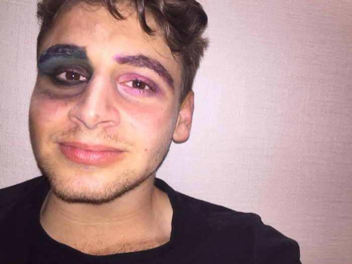 Joshua: selfie with playful colourful eye makeup, smiling