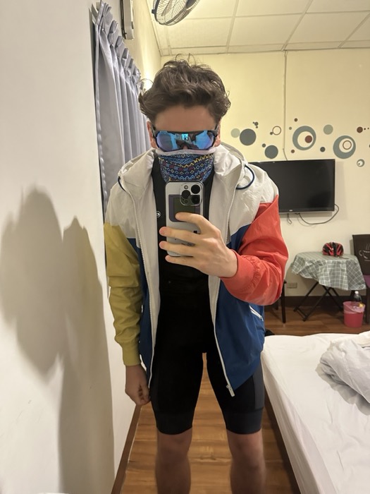 Joshua: mirror selfie in cycling bibs, jacket, sunglasses, buff