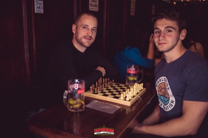 Joshua: playing chess over Tyskie beers with man at Teatro Cubano bar