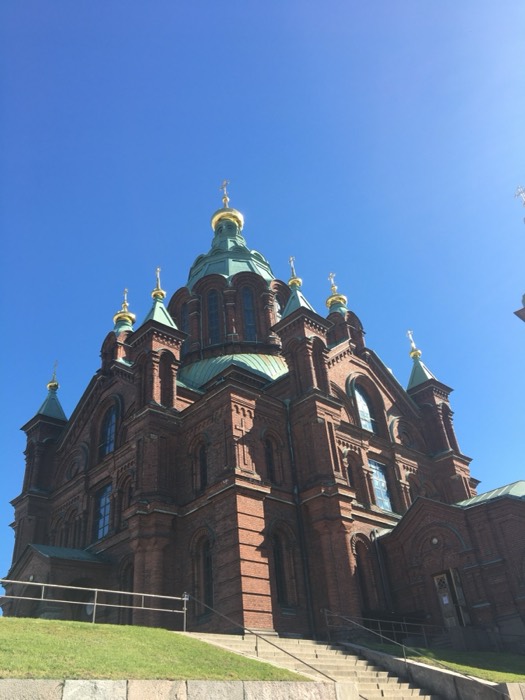 Uspenski Cathedral red-brick orthodox church with gold domes