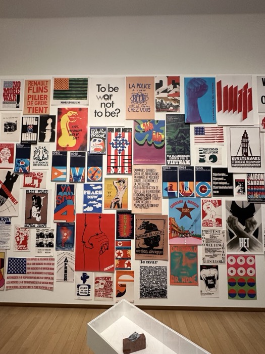 Wall of 1960s protest posters exhibit at Stedelijk Museum