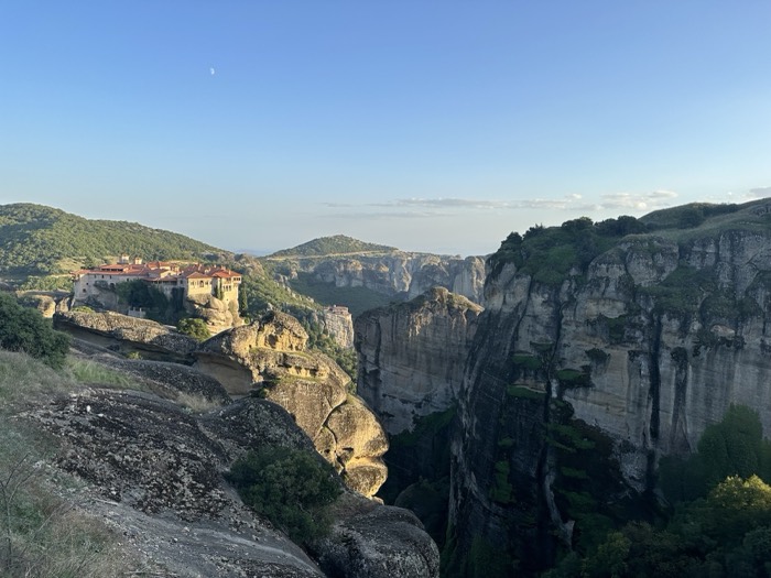 Varlaam monastery perched on cliff above Meteora valley