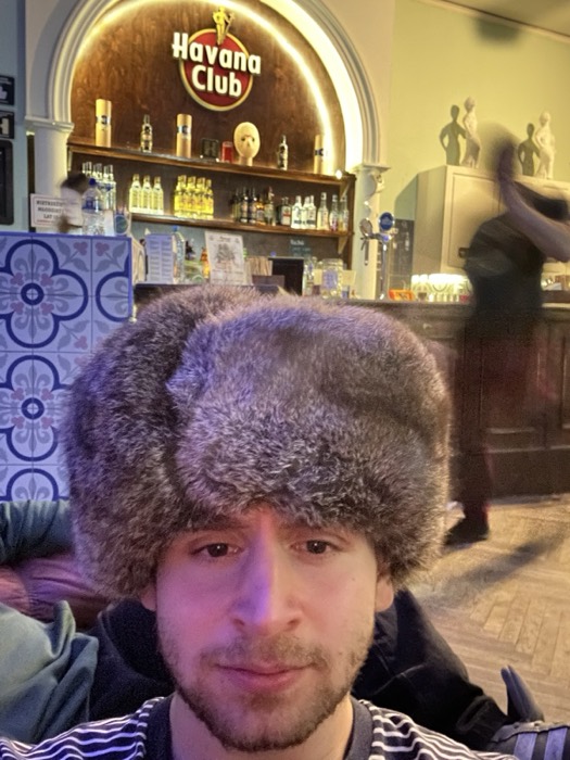Joshua: selfie in fur ushanka hat at Havana Club bar