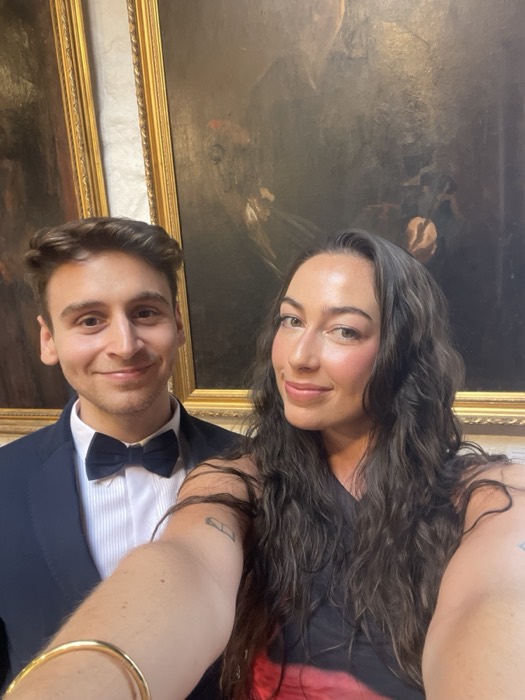 Joshua: tuxedo selfie with smiling friend in front of old master painting