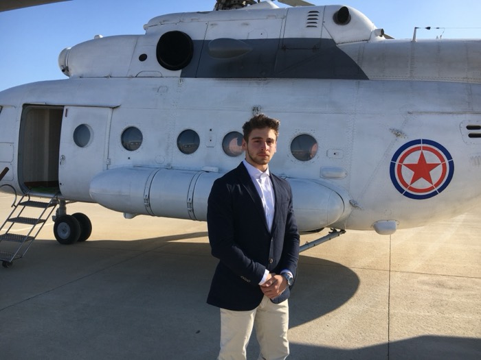 Joshua: full helicopter visible, suited, North Korean red-star insignia