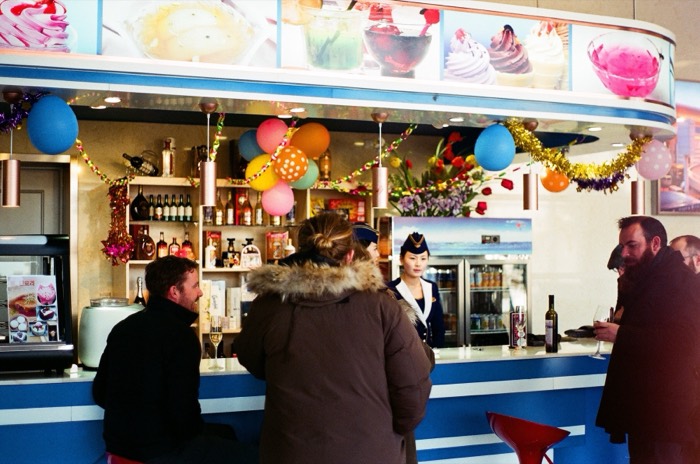 Air Koryo attendants at festive ice-cream bar, Pyongyang
