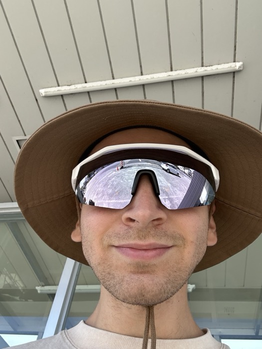 Joshua: selfie in bucket hat and mirrored cycling sunglasses