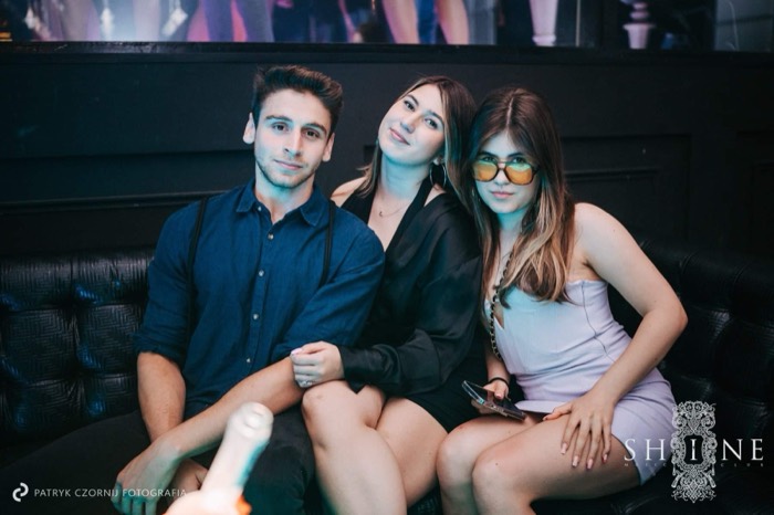Joshua: with two women on couch at SHINE Music Club, pro nightlife shot
