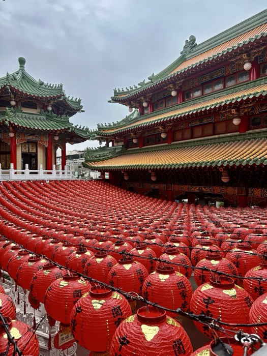 Striking temple with sea of red lanterns and tiered pavilions