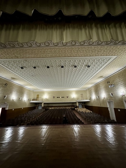 Empty Soviet theatre hall from stage, near-identical edited version