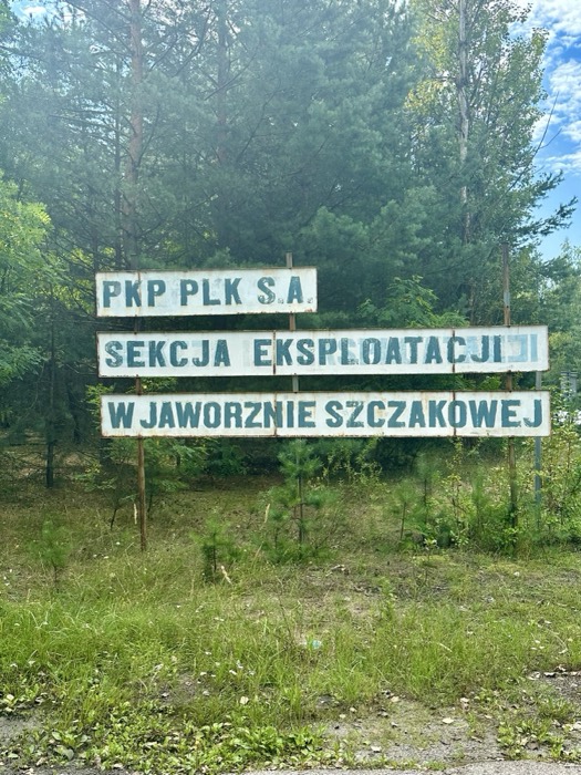 Polish railway maintenance signs, Jaworzno Szczakowa, weathered white boards