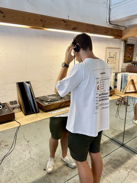 Joshua: record-shop headphones, edited near-identical version