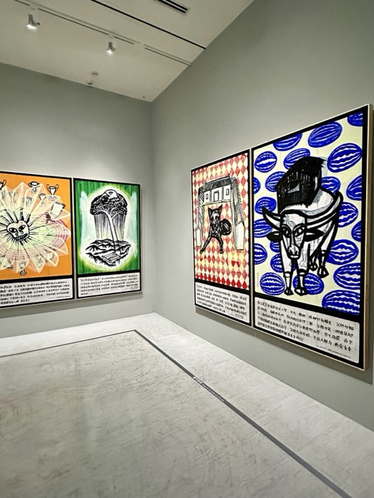 Edited duplicate of gallery corner with colorful bull paintings