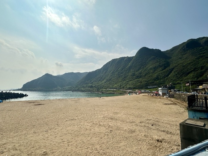 Edited duplicate of sandy bay and coastal mountains shot