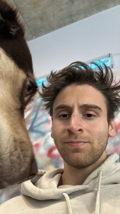 Joshua: selfie nose-to-nose with taxidermy animal head, neon and graffiti